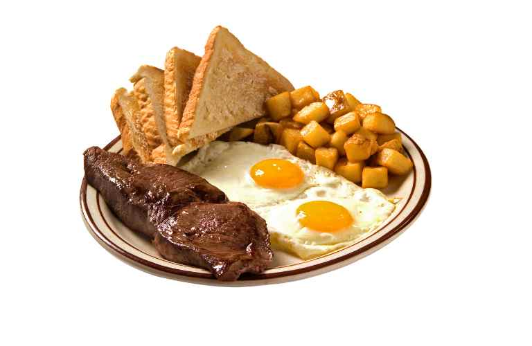 sloppy steak served with eggs and bread